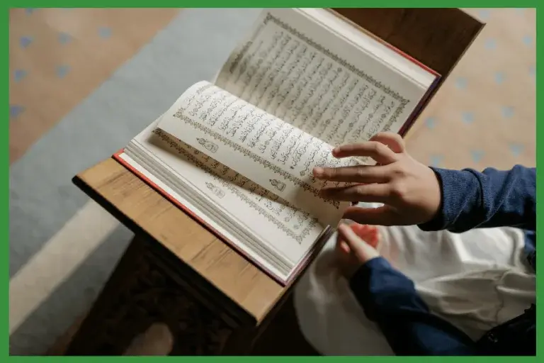 Student learning Quran reading from an open Mushaf during a Quran lesson